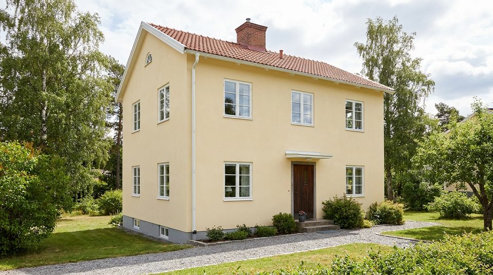 Målning av putsad fasad